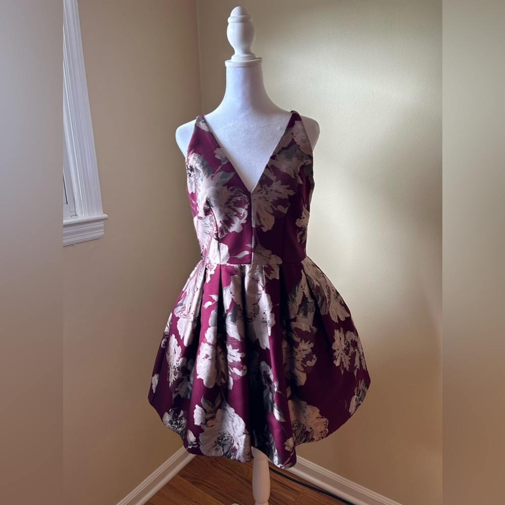 Purple floral cocktail dress with pockets. Size 6